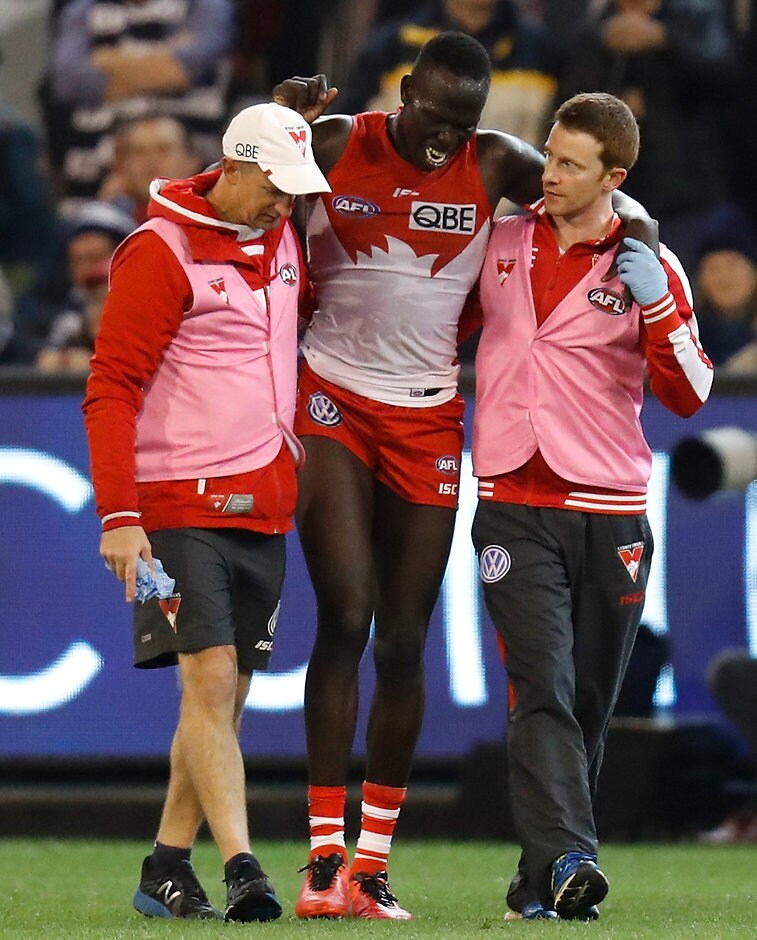AFL 2016 Second Preliminary Final - Geelong v Sydney MELBOURNE, AUSTRALIA - SEPTEMBER 23: Aliir Aliir of the Swans leaves the field injured during the 2016 AFL Second Preliminary Final match between the Geelong Cats and the Sydney Swans at the Melbourne Cricket Ground on September 23, 2016 in Melbourne, Australia. (Photo by Michael Willson/AFL Media)